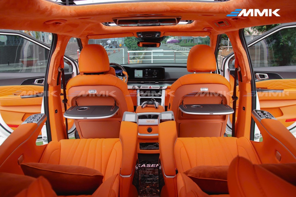độ ghế limousine màu cam hermes cho KIA Carnival