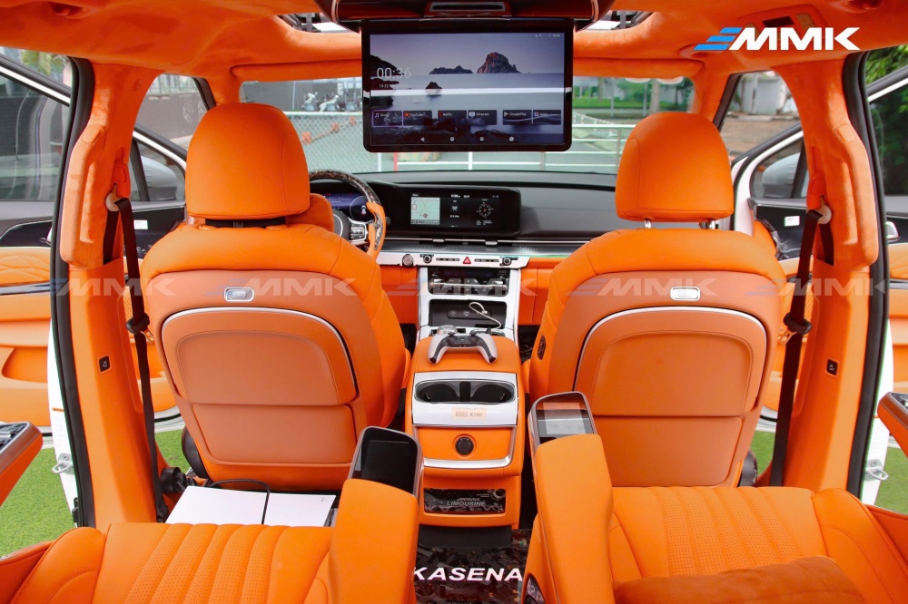 độ ghế limousine màu cam hermes cho KIA Carnival
