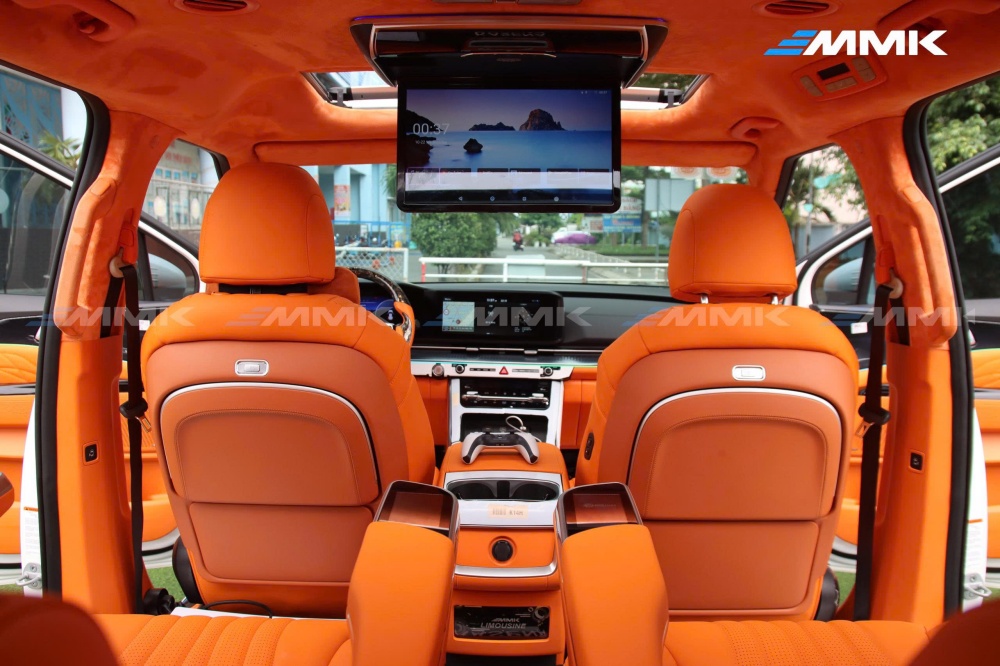 độ ghế limousine màu cam hermes cho KIA Carnival