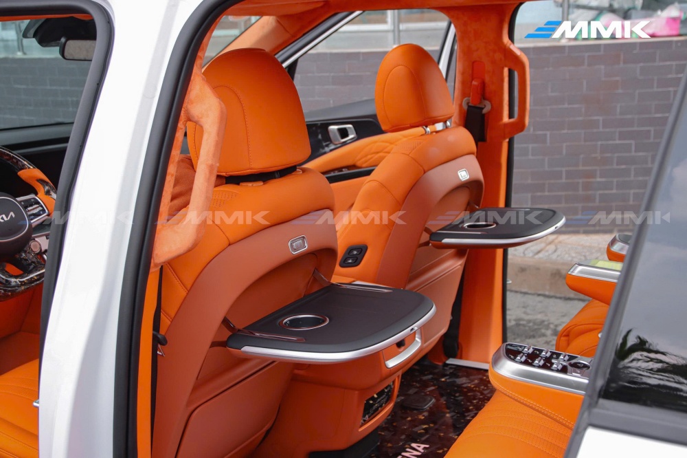 độ ghế limousine màu cam hermes cho KIA Carnival