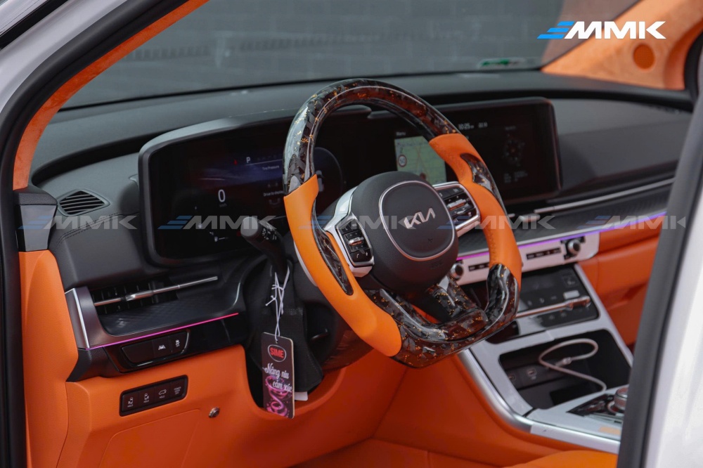 độ ghế limousine màu cam hermes cho KIA Carnival